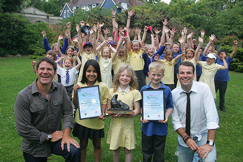 pupils and teachers celebrating